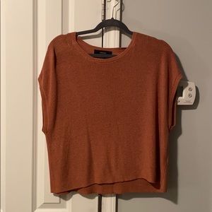 Super cute, and fun tank top sweater